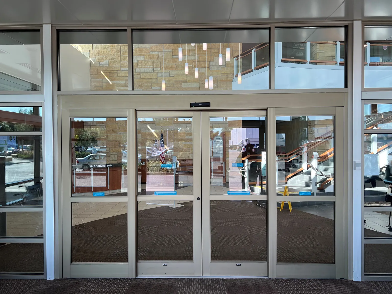 Automatic sliding entrance doors at a commercial building in Washington DC