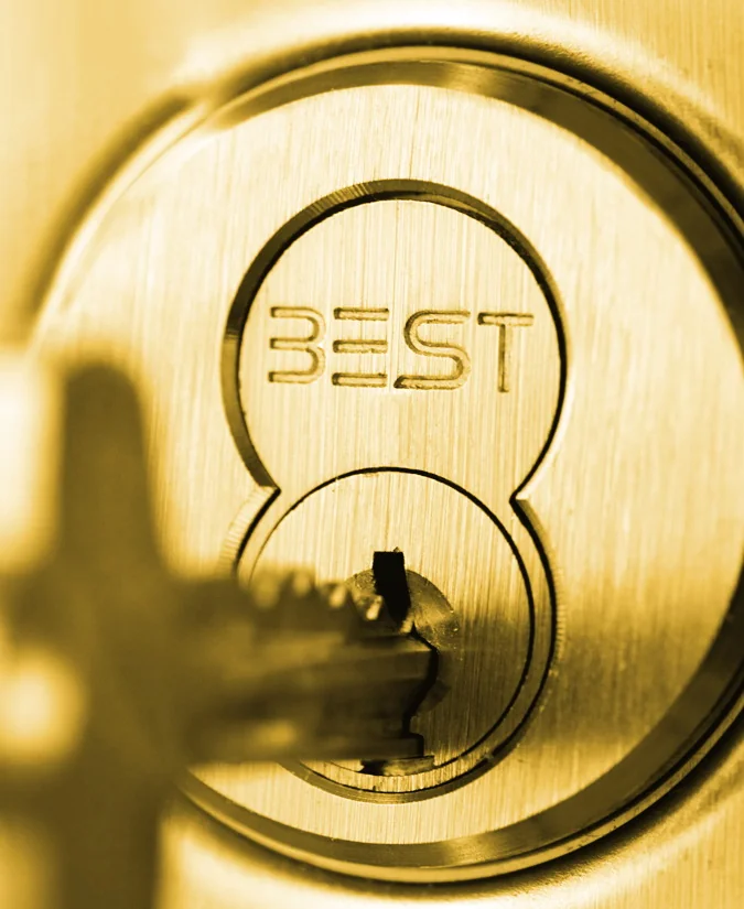 Close-up of a BEST interchangeable core cylinder with a key inserted, used in commercial lock installation in Washington DC