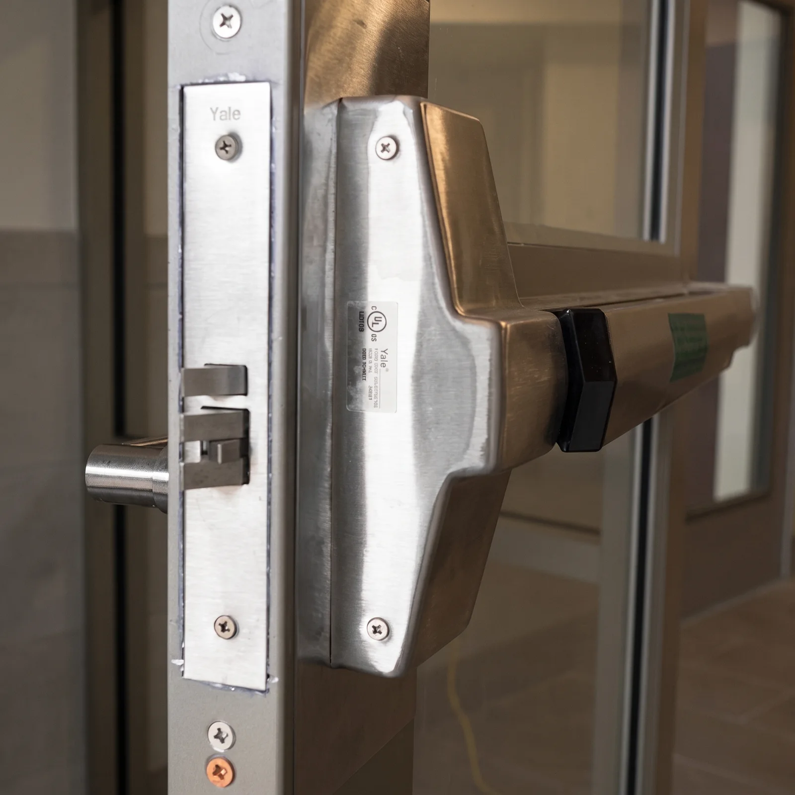 Panic bar (push bar) exit device and latch on a commercial glass door in Washington, DC